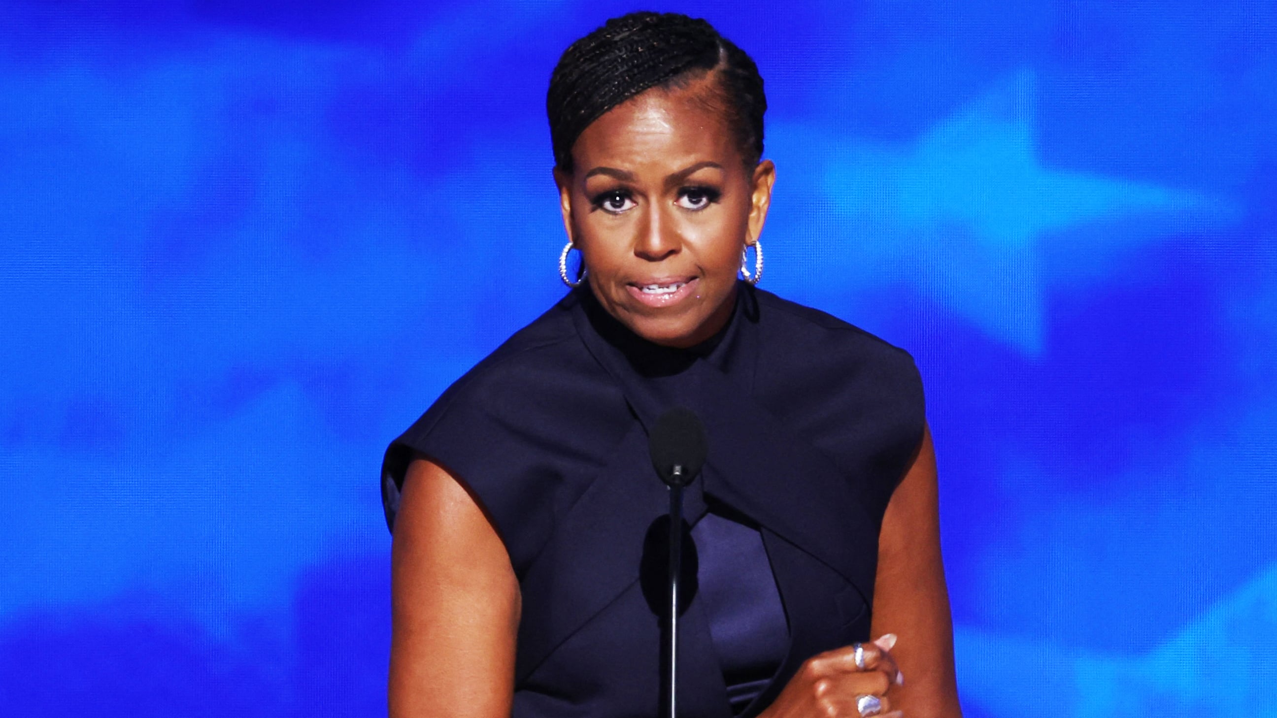 Former U.S. first lady Michelle Obama speaks during Day 2 of the Democratic National Convention (DNC) in Chicago, Illinois, U.S., August 20, 2024. REUTERS/Mike Segar