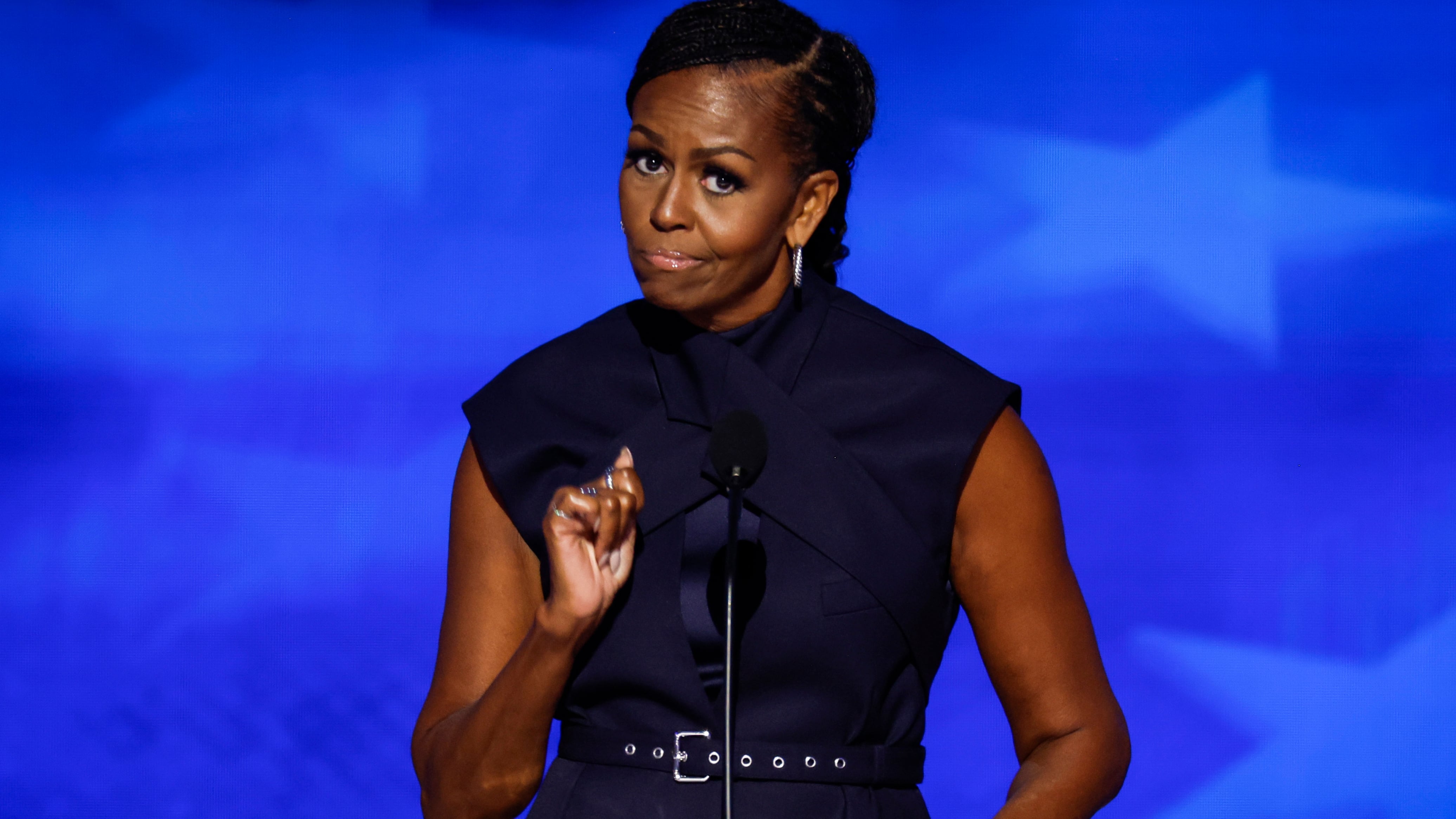 Former first lady Michelle Obama speaks on stage during the second day of the Democratic National Convention at the United Center on August 20, 2024 in Chicago, Illinois.