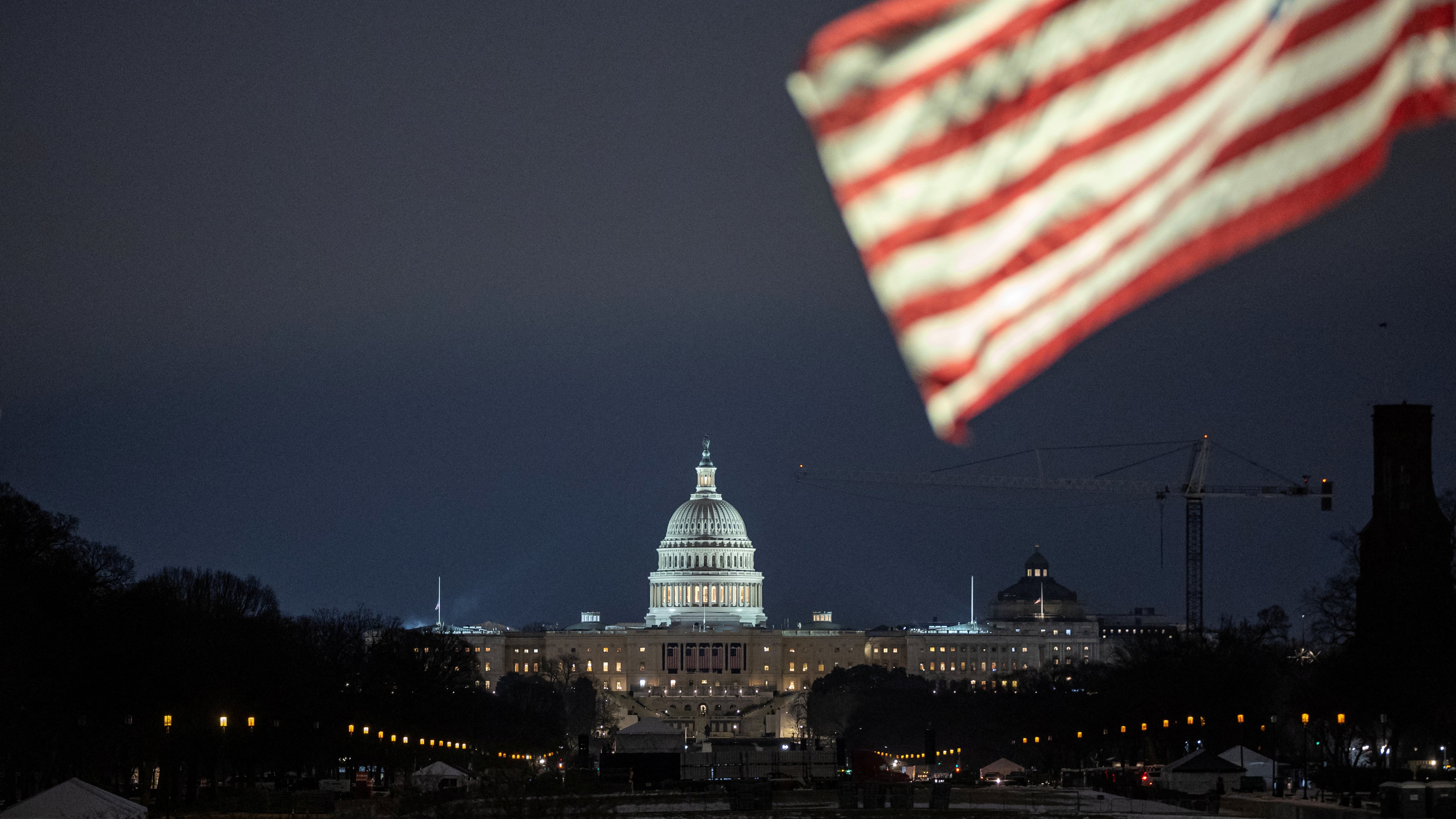 The U.S. flag flutters in front of the U.S. Capitol building, ahead of the presidential inauguration of U.S. President-elect Donald Trump, in Washington, U.S., January 16, 2025.